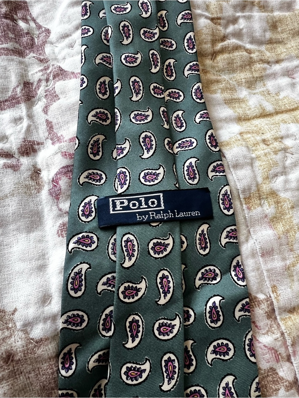 Vintage 1980’s Ralph Lauren tie in paisley green with pink accents.
